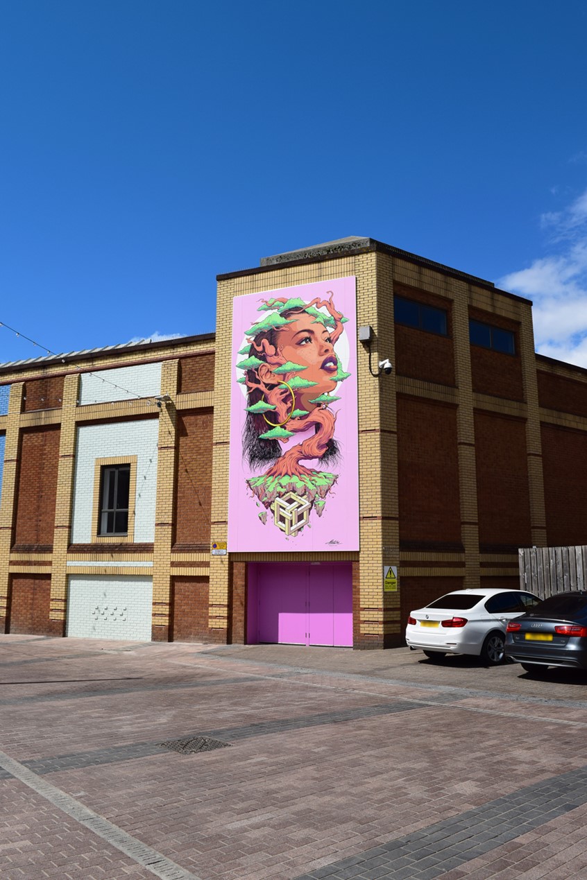 illustration of The mural brings together elements representing Coventry's mythic past, tangible present, and imagined future in a dreamlike composition where disparate realities intersect and inspiration is born. The 272 sq ft mural was hand-painted with acrylics by Matt Chu on fifteen individual plywood boards, then mounted to the masonry. The accompanying wall colours were also chosen and arranged by the artist.