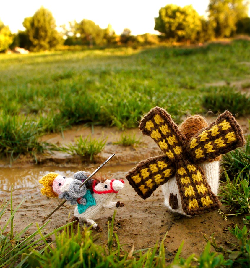 illustration of don quixote, man on horseback, horse, in-situ, dutch windmill, knight with sword, environment, knitting, fun character, cute knitting, fun gif, knitting toys, playful creatures, fantasy, soft sculptures, installations, knitting pattern, amusing, funny animation, handmade, hand knit, craft