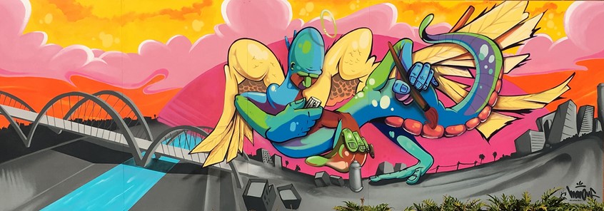 illustration of Public art commissioned by the city of Los Angeles (Arts District DTLA, California). The mural depicts the City of LA as a modern day Quetzalcoatl of the arts. The creature protects the city and access to the LA River while giving a nod to the soon to be iconic architecture of the new 6th street bridge.
Aerosol and acrylic on wood panels.
7'H x 20'W