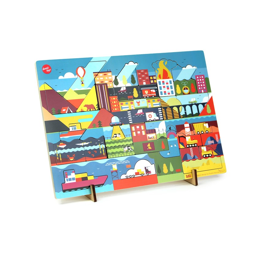 illustration of Puzzle made for Ikonic Toys. A3, 42 x 30 x 1 cm. Wooden design puzzle, consists out of 32 pieces. Two layered design puzzle that surprises you with an illustration related to the piece that was taken away.
Comes with 2 little stands to display the puzzle as a decorative object.