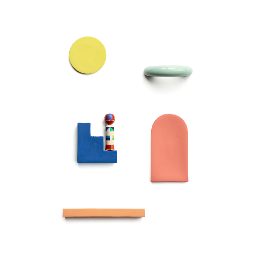 illustration of ‘Twist & Turn’ modular wall object collection. Elegant and functional handmade ceramic wall sculptures.
This set includes five unique porcelain shapes, each crafted by hand and glazed in a different, playful color. It can be used purely as decorative wall art, or it can also be mixed and matched with other pieces of the collection to build a playful abstract composition.